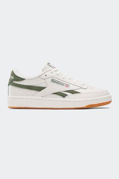 Give your sneaker collection a retro-inspired injection with the Reebok Club C Revenge. The upper is crafted from leather and features suede side stripes. These sneakers are a versatile staple that you will pair back with all of your favourite outfits. Reebok Club C, Club C, Classic Sneakers, Sneaker Collection, Retro Inspired, Revenge