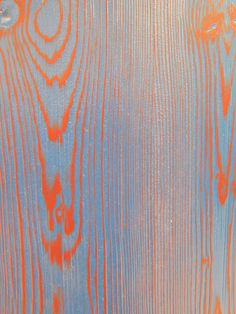 an orange and blue wood grain pattern is shown