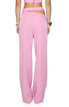 Influenced by traditionally polished tailoring, these pinstriped wide-leg pants are revamped in bubblegum pink and boast a Y2K-inspired split waistband. 31" inseam; 22" leg opening; 11" front rise; 14" back rise (size Medium) 96% polyester, 4% elastane Dry clean or machine wash, line dry Imported Spring Wide Leg Pants With Vertical Stripes, Pinstripe Wide Leg Pants For Spring, Spring Pinstripe Wide Leg Straight Pants, Pink Bottoms With Vertical Stripes For Summer, Pink Pinstripe Pants, Pink Vertical Striped Bottoms For Summer, Summer Pink Bottoms With Vertical Stripes, Pink Vertical Stripes Bottoms For Summer, Pink Straight Pants With Side Pockets