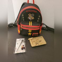 This Bundle Comes With Every Item Pictured. The Backpack And Cardholder Are Used. Backpack Is In Good Condition, Loungefly, Missing The Triwizard Charm So I've Included A Cute Wand Keychain :) The Cardholder Is Used With Some Wear But Super Adorable And This Set Is Perfect For A Harry Potter Fan. I've Loved The Set A Lot, So It's Time For A New Home Now. Sold As Is. See All Photos For Details Loungefly Bag, Harry Potter Fan, New Home, Harry Potter, Card Holder, Black And Red, Bag Lady, Bundles, Backpacks