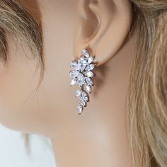 These Beautiful Romantic Swarovski Crystal BRIDAL Flower Leaves Earrings are made of very fine quality of Swarovski Crystals available in Silver, Gold and Rose gold finish for your special day! Even we have hard time taking pictures because of their shine 😄 so we want to shine our brides on their special days. The material used in these earrings are free from Lead, Nickel, Cadmium so it will not give you any skin irritation and environment friendly too.. ► ABOUT YOUR ORDER * All items are neatl Formal Dangle Flower Earrings With Cubic Zirconia, Glamorous Crystal Flower Earrings For Wedding, Elegant Flower Earrings With Sparkling Stones For Wedding, Elegant Wedding Flower Earrings With Sparkling Stones, Wedding Flower Earrings With Sparkling Cubic Zirconia, Cubic Zirconia Flower Earrings For Wedding, Wedding Crystal Flower Earrings, Sparkling Stones Drop Earrings For Wedding, Wedding Flower Drop Earrings With Sparkling Stones