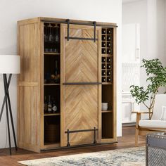 a large wooden cabinet with wine racks on the door and shelves in front of it