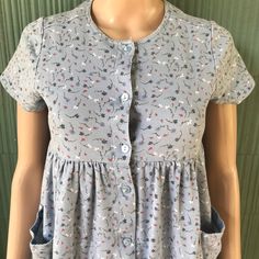 "Adorable vintage 90's dark blue floral button down babydoll dress. Ideal floral print! Midi length. 100% cotton. Quality construction. Made by Christie Brooks. Tagged size youth 14, and will fit a women's extra small or small just fine. A bit smaller in the bust. Great vintage condition! Such a cutie. Measurements laying flat: fabric stretches. Armpit to armpit: 18\" waist: 18\" Hips: 28\" length: 36\"" Button-up Cotton Floral Print Dress, Cotton Button-up Dress With Floral Print, Cotton Floral Print Button-up Dress, Boho Vibe, Unique Dresses, Babydoll Dress, Midi Length, Blue Floral, Baby Dolls