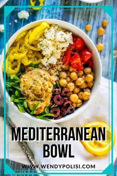 mediterranean bowl with chickpeas, tomatoes, olives, and feta cheese