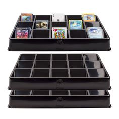 two black trays with cards and magazines in them