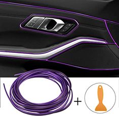 an image of a car door handle with purple lines on the side and black interior