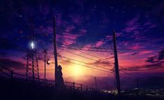 a person standing on top of a hill next to power lines under a purple sky