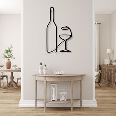 a table with a wine glass and bottle on it in front of a wall mounted clock