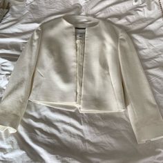 Brand New, Never Worn White Collarless Blazer - Us Size 2 (Runs Small); Eur Size 34. Never Altered (Sleeves Are Slightly Long For 5’0 Tall Person). Hidden Hook Closures, Boxy Fit. White Cropped Outerwear For Formal Occasions, Tailored White Cropped Jacket For Spring, Elegant White Cropped Jacket For Spring, White Cropped Formal Outerwear, Formal White Cropped Outerwear, Timeless White Blazer With Hidden Button Closure, White Blazer With Hidden Button Closure, White Tailored Cropped Outerwear, Tailored Cropped White Outerwear