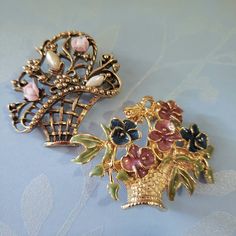 CHOOSE ONE;Vintage  Flower Basket Brooches ,Enamel Multicolored  Floral Basket pin brooch., Enamel Multicolored Gold ton brooch 1 1/2' x2' .Old Gold ton Faux Pearl ,Ceramic  brooch -2' x 2'  -this brooch -Pendant.  Brooches is good condition, comes in gift box .Gift wrap is available if this is being sent as a gift Thank you for viewing and please contact me if you have any questions . I don't accept cancellations .Thank you for shopping! Vintage Enamel Flower Brooches, Vintage Flower Enamel Pin For Collectors, Vintage Flower Enamel Pin Collectible, Vintage Enamel Wedding Brooches, Vintage Enamel Flower Brooch, Vintage Flower Enamel Pin, Vintage Flower Enamel Pin Gift, Vintage Flower Enamel Pin For Gift, Vintage Enamel Brooches