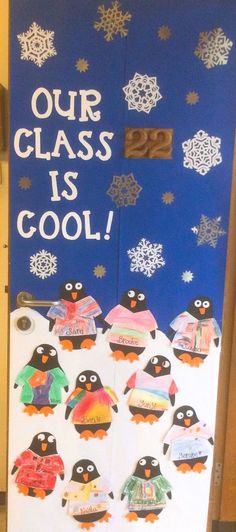 a bulletin board with penguins and snowflakes on it that says our class is cool