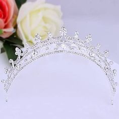 "Handmade Tiaras/Crown Wedding Tiaras/Crown Diamond Weight -- 12.22ct Diamonds-- American diamonds Diamond shape -- Round/Princess Diamond quality-- Zircon Metal -- Sterling Silver Silver Purity --92.5% Silver Wt. -- 47.43gm Tiaras Length -- 18inch) Tiaras Finishing white/gold Listing is For One (1) Piece These items are handmade, All are designed and handmade me and team with precision, Perfect craftsmanship and strong interest! We are continuously adding new products in our store. So keep comi Elegant Silver Crown For Wedding, Wedding Jewelry With Crown Design, Silver Wedding Crown With Pinched Shape, Wedding Jewelry With High Crown And Crown Design, Wedding Crown With Structured Princess Style, Silver Princess Crown With Pinched Shape, Princess Style Wedding Crown With Structured Shape, Princess Style Wedding Crown With Structured Design, Princess Style Structured Crown For Wedding