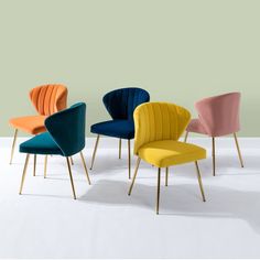 four chairs in different colors and sizes