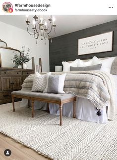 a large bed sitting on top of a white rug