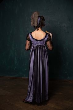 Exquisite half-mourning Regency gown, or just evening dress with modest tulle embelishments. The dress consists of two layers. The underlayer is gentle purple colour satin (100% cotton) and the outer layer is black tulle. The sleeves and decoration elements are made of tulle too. The bottom line is decorated with black cord. The bodice of the dress closes on back. The decolette line and empire waist line are adjustable due to the drawstring. The in stock dress will best fit for the following mea Evening Gown In Purple Organza, Evening Purple Organza Gown, Evening Organza Gown In Purple, Elegant Purple Gown For Debutante Ball, Elegant Purple Organza Gown, Elegant Victorian Evening Dress In Satin, Elegant Victorian Dress In Satin For Evening, Elegant Victorian Satin Dress For Evening, Elegant Satin Victorian Dress For Evening