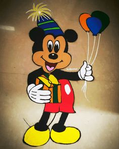 a mickey mouse with balloons and a birthday hat