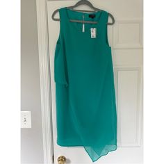 Pretty Chiffon Dress In A Gorgeous Jewel Tone Teal-Y Green. Would Be Great For A Semi Formal Event, Church, Or Even For Work. Nwt Green Sleeveless Chiffon Dress For Spring, Flowy Chiffon Dress For Workwear, Sleeveless Chiffon Dress With Overlay, Green Flowy Dress For Work, Flowy Summer Dress With Overlay, Flowy Sleeveless Dress For Work, Summer Chiffon Workwear Dresses, Summer Chiffon Dress For Work, Be Great