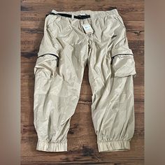 Nike Tech Lined Woven Pants ‘Khaki Black’ (Size Us Mens Xxl). Condition Is New With Tags. Come As Seen In Pictures. Any Questions Send A Message. All Items Are Shipped Within 24hrs Of Purchase Nike Cargo Bottoms, Beige Cargo Style Bottoms For Outdoor, Beige Cargo Pants For Outdoor, Nike Utility Cargo Pants, Khaki Parachute Pants With Belt Loops For Outdoor Activities, Khaki Parachute Pants With Belt Loops For Outdoor, Nike Cargo Pants For Streetwear, Nike Parachute Pants With Pockets For Outdoor, Nike Outdoor Pants With Side Pockets