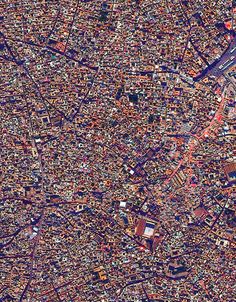 an aerial view of a city with lots of buildings