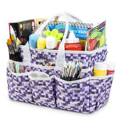 two baskets filled with arts and crafts supplies