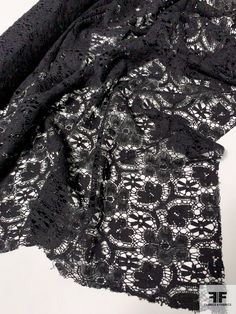 an image of black lace on white background