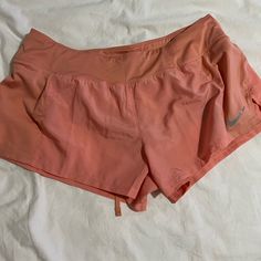 Peach Color Running Shorts Dri-Fit Nike Nwt Size : Xl Pink Athletic Shorts With Pockets For Spring, Pink Nike Athletic Shorts For Spring, Nike Pink Athletic Shorts For Summer, Nike Pink Athletic Shorts For Spring, Spring Nike Pink Athletic Shorts, Pink Workout Athletic Shorts With Pockets, Pink Athletic Shorts With Pockets For Workout, Pink Nike Bottoms For The Beach, Pink Nike Bottoms For Beach