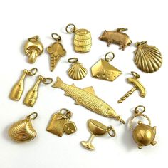 Food & Beverage Themed Charms -Quantity: 1 Charm -Choose your charm from the drop down menu -Mix of vintage and modern brass charms -These also make a fun little gift for someone special! ITEM DESCRIPTION For this choose a charm listing, I went with a food and beverage theme!  The charms are a mix of vintage and modern, all brass metal. Many are stampings (slightly dimentional on the front and hollow on the back), a few are puffy (double sided and hollow on the inside), and the rest have a flat Gold Themed Charm Bracelet, Gold Novelty Jewelry For Party, Themed Gold Charm Bracelet, Vintage Charm For Valentine's Day Gift, Vintage Gold Jewelry For Birthday, Themed Gold Jewelry For Party, Valentine's Day Gift Vintage Charm, Valentine's Day Gift: Vintage Charm, Gold Novelty Charm Necklaces For Gifts