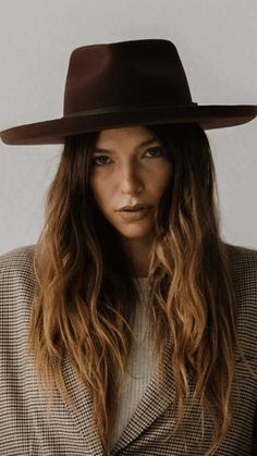 DESCRIPTION:With a soft oiled leather band and a pinched teardrop crown, the Luca is our new go-to fedora. The classic fedora shape is mixed with a structured pencil roll brim, making Luca an easy choice for new hat lovers and the most avid hat girls. The Dark Cherry color is perfect for fall and winter, and the 100% Australian Wool content will keep you warm all season long. Color: Dark Cherry Content: 100% Australian Wool + Oiled Leather Band + Metal Closure Dimensions - Crown: 11 cm Brim: 9.5 Leather Hats With Curved Brim In Country Style, Casual Leather Felt Hat With Curved Brim, Chic Leather Hat For Fall, Elegant Brown Leather Hat, Vintage Brown Hat For Everyday, Chic Brown Everyday Hat, Chic Leather Hat With Curved Brim, Everyday Brown Flat Crown Hats, Classic Brown Hat With Waxed Finish