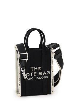 Outside: 64% Cotton, 36% Polyester The Tote Bag Marc Jacobs, Marc Jacobs Tote, Crossbody Tote Bag, Mini Tote Bag, Marc Jacobs Bag, The Tote Bag, Crossbody Tote, Mini Tote, Black Tote Bag