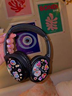 Eclectic Vibes and Bright Neon Colors, Aesthetically Pleasing cute Lisa Frank stickers on all black Bose headphones Bose Headphones Aesthetic Black, Black Headphones With Stickers, Headphones Aesthetic Sticker, Stickers On Headphones, Black Headphones Aesthetic, Bose Headphones Aesthetic, Bose Headphones