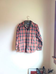 Up for sale is a vintage 1970's wool plaid Fieldmaster button down flannel in men's estimated medium to large. Overall the garment is in excellent condition with no major rips, tears, or stains. The only flaws I could note were a couple tiny pinpoint type holes on the lower back of the shirt (see photo). There may be some pilling or tiny spots of discoloration consistent with age, though again nothing major was noted. This is an excellent condition given that many of these old wool flannels were beat up quite a bit due to heavy wear / hunting / etc. Fieldmaster 100% Wool Tag size: L Estimated size: Men's M to L Measured flat: Inches long: 29 Inches pit to pit: 21 1/2  Inches shoulder to shoulder: 18 Inches cuff to shoulder: 24 Vintage Collared Flannel Shirt For Winter, Vintage Plaid Flannel Shirt For Fall, Long Sleeve Wool Plaid Flannel Shirt, Vintage Collared Flannel Shirt, Vintage Plaid Flannel Shirt, Casual Plaid Yarn-dyed Flannel Shirt, Vintage Plaid Flannel Shirt With Button Closure, Classic Yarn-dyed Cotton Flannel Shirt, Vintage Plaid Long Sleeve Flannel Shirt