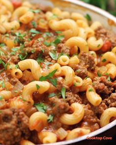 pasta with ground beef and parsley in a skillet