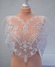 Bridal flower cape Wedding cover up Beaded Bridal Cape | Etsy Fitted Capelet With Cape Sleeves For Wedding, White Lace Wedding Shawl, Lace Shawl With Lace Trim For Wedding, Wedding Shawl With Lace Trim, White Lace Shawl For Wedding, Intricate Embroidery Shawl For Wedding, Fitted Lace Wedding Shawl, Fitted Lace Shawl For Wedding, White Embroidered Shawl For Wedding