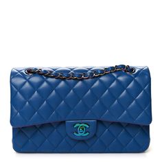 This is an authentic CHANEL Lambskin Quilted Medium Double Flap in Blue and Pink. This shoulder bag is crafted of diamond quilted lambskin leather in blue. It features a multicolor leather threaded chain link shoulder strap and a facing flap with a matching CC turn lock. This opens the bag to reveal an inner flap to a pink leather interior with patch pockets. Thread Chains, Leather Thread, Diamond Quilt, Blue And Pink, Pink Leather, Leather Interior, Lambskin Leather, Chain Link, Patch Pocket