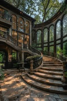 a large house with lots of windows and stairs