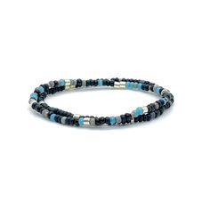 Angle Band: Flat woven; 3/8"w; glass seed beads; sterling silver clasp & 1" extender chain. Bracelet Strand A: Stretch style; 6mm gunmetal coated lava beads; 4mm natural dumortierite beads; glass seed beads; finished with a 5mm stainless steel bead. Bracelet Strands B & C: Stretch style; 3mm glass seed beads. Perfect solo or stacked. Bracelet Size Guide Adjustable Gunmetal Bracelet For Everyday, Adjustable Heishi Bead Jewelry With Black Beads, Adjustable Gunmetal Beaded Jewelry, Adjustable Beaded Gunmetal Jewelry, Adjustable Minimalist Gunmetal Bracelet, Modern Adjustable Beaded Bracelets With Tiny Beads, Adjustable Single Strand Beaded Bracelets, Adjustable Single Strand Beaded Bracelet, Modern Adjustable Stretch Bracelet With Round Beads