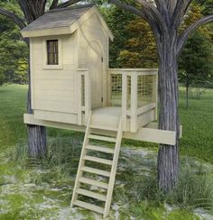 a tree house with stairs leading up to it and trees in the grass around it