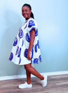 African Print Women's Tunic an| Kaftan| dashiki | Esiki | Esiki Dress| Agbada for Women| Women's Agbada| Wedding |Wardrobe Essentials |Tribal Print | African Print Product Description Aissa - Esiki dress This Agbada or also known as Esiki can be worn as a dress or a shirt with jeans or skirts. Sleeve Length: Sleeveless Fabric Content: 100% Cotton Fabric Quality: Authentic Wax Print Fabric Style: Tunic | Kaftan Collar: No Collar Lining: Lined Lining Material: None Embroidery: Embroidered Country Purple Cotton Relaxed Fit Dress, Purple Relaxed Fit Cotton Dress, Printed Cotton Purple Dresses, Purple Cotton Printed Dresses, Purple Printed Cotton Dress, Purple Relaxed Fit Short Sleeve Dress, Roots Clothing, Shirt With Jeans, Wedding Wardrobe