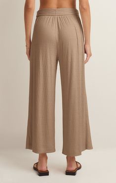 Take your casual look to the next level with the elevated, wide leg Isla Pucker Knit Pant. This pull on style features flattering details that will make this a pant you reach for on repeat. Versatile Wide Leg Pull-on Pants For Loungewear, Solid Color Wide Leg Pants With Relaxed Fit, Effortless High-waisted Wide Leg Pants With Elastic Waistband, Effortless Wide Leg Pants With Elastic Waistband, Beige Wide Leg Pull-on Bottoms, Effortless Wide Leg Bottoms With Elastic Waistband, Versatile Pull-on Wide Leg Pants For Loungewear, Effortless Beige Bottoms, Effortless Solid Bottoms With Elastic Waistband