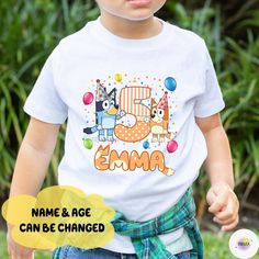 a young boy wearing a birthday shirt with the name and age can be changed on it