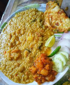 a white plate topped with lots of food