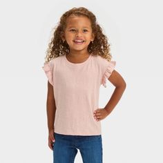 Add a sweet finish to their laidback looks with this Pucker Knit Short-Sleeve Top from Cat & Jack™. This regular-fit top in a solid hue features a casual crew neckline, short dolman sleeves with frill detailing and puckered texture for extra flair. The midweight cotton-blend fabric with added spandex offers a comfortable, flexible fit, while the pullover style allows for easy wear. Have them pair this knit tee with a range of shorts, pants or skirts for versatile outfit options. Cat & Jack™: Des Cute Cotton Knit Top For Spring, Soft-washed Tops For Spring, Playful Relaxed Fit Top For Spring, Playful Crew Neck Tops, Playful Short Sleeve Top, Playful Soft-washed Tops For Summer, Cute Soft-washed Spring Tops, Soft-washed Pink Top For Spring, Playful Relaxed Fit Soft-washed Tops