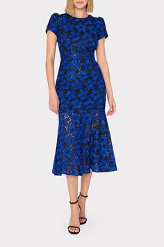 Relish in this Fall’s take on our signature floral embroidered dress—a mix of bold cobalt blue covered in black florals that serve as a mesh overlay atop a short sleeve, curve-hugging silhouette that falls to a chic midi-length hemline. Midi Dress Sleeves, Tulle Embroidery, Hugging Silhouette, Floral Embroidered Dress, Cocktail Evening Dresses, Maxi Dress Cocktail, Mesh Overlay, Denim Coat Jacket, Midi Dress With Sleeves