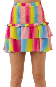 Rows of rainbow-inspired stripes playfully animate this smocked-waist miniskirt finished with flouncy ruffled tiers. Smocked waist Lined 100% polyester Hand wash, dry flat Imported Tiered Pink Mini Skirt With Ruffles, Tiered Ruffled Mini Skirt In Pink, Playful Ruffled Skirt For Spring, Pink Tiered Skirt With Elastic Waistband, Playful Spring Tiered Skirt, Playful Multicolor Skirt With Elastic Waistband, Multicolor Ruffle Hem Skirt For Summer, Multicolor Skirt With Ruffle Hem For Summer, Playful Multicolor Ruffled Skirt