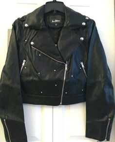 This is a great jacket from Sam Edelman. It has great studded detail and a lot of stretch in the fabric. I have listed some approximate measurements below. Thanks! S: 16" long, 16" across at the armpits when laying flat M: 17" long, 18" across at the armpits when laying flat L: 17" long, 20" across at the armpits when laying flat Details A classic moto jacket is a must have essential with asymmetrical zip closure and stud accents for an extra flair of style. - Notch collar - Asymmetrical front z Fitted Studded Biker Jacket For Spring, Studded Long Sleeve Biker Jacket For Spring, Spring Biker Leather Jacket With Studs, Biker Leather Jacket With Studs For Spring, Biker Style Studded Leather Jacket For Spring, Fitted Studded Leather Jacket For Spring, Biker Style Studded Outerwear For Fall, Edgy Fitted Outerwear With Rhinestone Rivets, Fitted Leather Jacket With Rivets For Winter