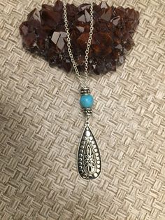 Boho Antique Silver Teardrop, Turquoise colored bead necklace. Comes with GIFT BOX.                                                                          Available in 18 - 24 inch chain length.  Every piece is designed and shaped in B&B Jewelry Studio, Conway Ar. Turquoise Bead Necklaces, Necklace Turquoise, Jewelry Studio, Turquoise Beads, Boho Necklace, Necklace Gift, Bead Necklace, Chain Length, Pendant Necklaces