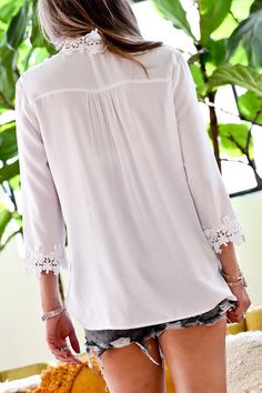 Lace trim detail blouse top -100% rayon -lace trim detail -3/4 sleeve -loose fit casual Chic Long Sleeve Tops With Cutwork Hem, White Long Sleeve Tops With Cutwork Hem, Casual Blouse With Lace Sleeves For Brunch, White Tops With 3/4 Sleeve And Lace Trim, Casual Tops With Lace Trim For Work, Casual Lace Trim Tops For Work, Chic Rayon Tops With 3/4 Sleeve, Casual White Blouse With Lace Cuffs, Elegant Long Sleeve Tops With Crochet Trim