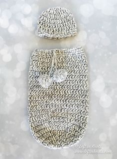 a crocheted baby's hat and diaper cover on a white background