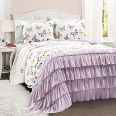 PRICES MAY VARY. This beautiful piece combines serene elegance with fashionable style. The top portion is created with a colorful array of graceful butterflies, while the bottom portion is clothed with gorgeous ruffles where the butterflies will eventually land to rest. Spoil your little one with colors, ruffles and butterflies! This enchanting quilt set brings bursts of imagination and fun to their bedroom decor. The inviting style of this quilt and generous size is the perfect bedding for your Oversized Quilt, Butterfly Room, Big Kids Room, Butterfly Quilt, Lush Decor, Bedding Stores, Reversible Quilt, Quilt Set, Kids Bedding