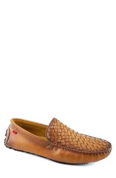 An upper of woven leather emphasizes the relaxed, warm-weather appeal of a loafer that moves comfortably across your wardrobe on a segmented driver sole. Removable insole Leather upper and lining/rubber sole Made in Brazil Casual Woven Leather Loafers With Round Toe, Brown Business Loafers With Woven Sole, Brown Leather Moccasins With Woven Sole, Business Leather Loafers With Woven Detail, Casual Slip-on Loafers With Woven Leather, Leather Woven Round Toe Moccasins, Casual Brown Woven Leather Loafers, Luxury Casual Woven Leather Loafers, Leather Slip-on Shoes With Woven Sole